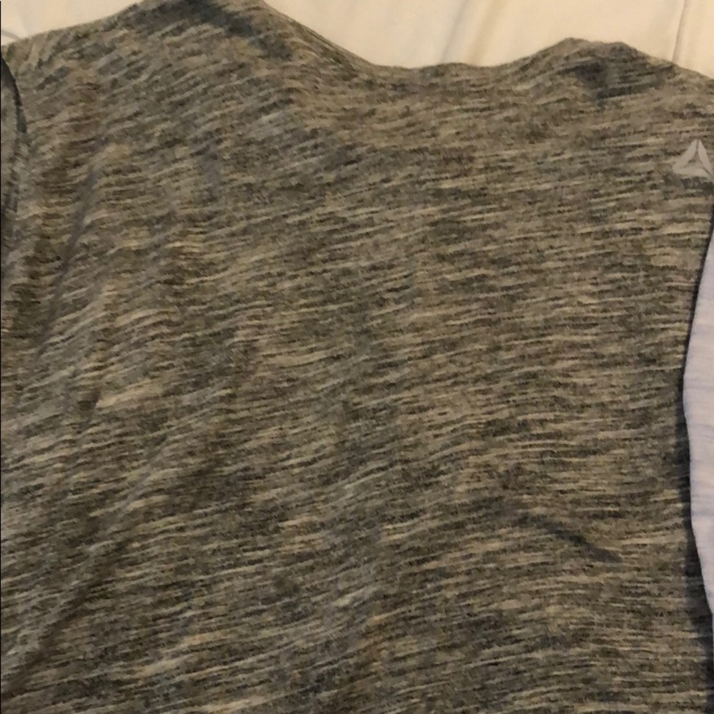 Two Reebok tie back tanks